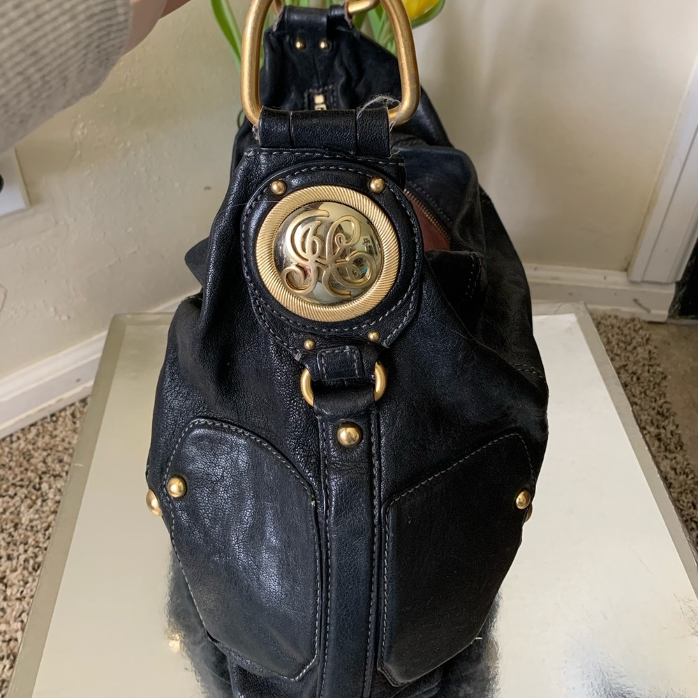 Juicy Couture Leather hobo bag.